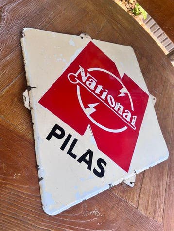 Emailleplaat National Pilas – Spaanse advertentie uit de
