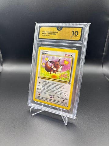 Pokémon - 1 Graded card - Eevee Jungle Dutch Première, Hobby en Vrije tijd, Verzamelkaartspellen | Pokémon, Nieuw