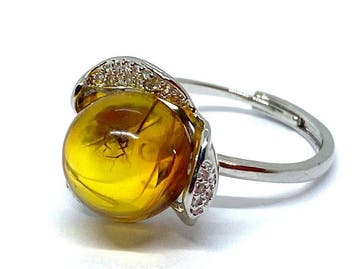 Ronde Baltisch amber ring met oude insecteninclusie fossiel