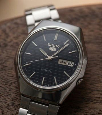 Seiko - Vintage Seiko 5 Automatic – Pinstripe Black Dial -, Handtassen en Accessoires
