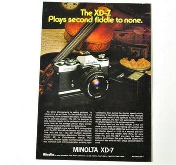 Vintage Minolta XD-7 spiegelreflexcamera – reclame uit 1979, Collections, Verzenden