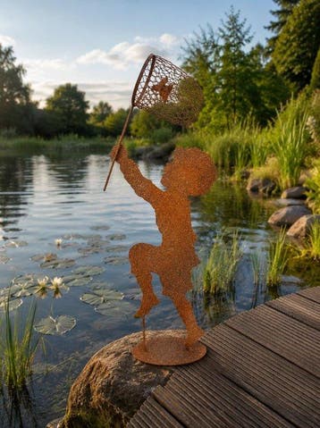 Statue, garden statue silhouette of boy with butterfly net -