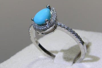 Turquoise ring - Hoogte: 24.6 mm - Breedte: 20.5 mm- 2.2 g -