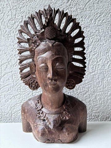 Set intricate traditional hand-carved Balinese dancer busts