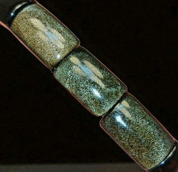 Hoogwaardige goudkleurige obsidiaanarmband. Natuurlijke