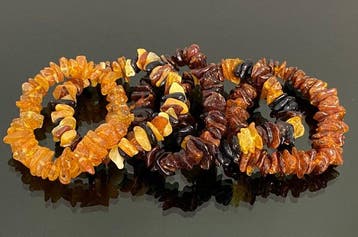Collectie van 5 meertinten Baltische amber armbanden - Een