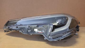 Koplamp Toyota Corolla E21 facelift Full LED Origineel Links, Verzenden, Nieuw