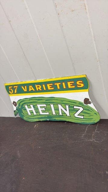 Vintage Heinz “57 Varieties” reclamebord – augurk vorm
