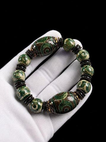 Bracelet tibétain exclusif avec un Dzi en dent de tigre -