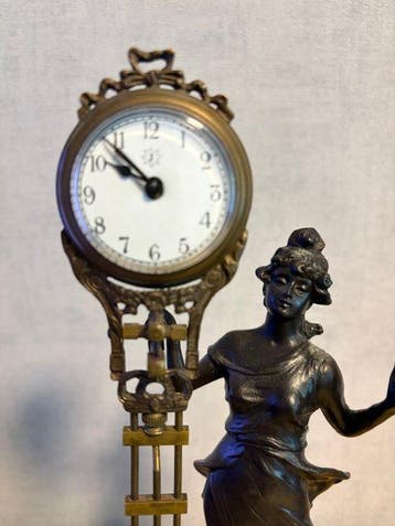 Mystery slingerklok - Brons - 1970-1980 - mysterieuze