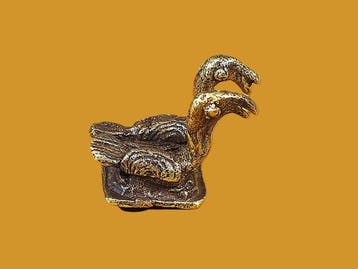 Het gewicht om figuurlijk goud te wegen. Een paar kaketoes.