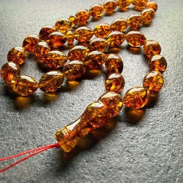 Amberkleurige islamitische tasbih (gebed- en