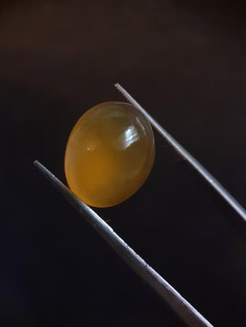 Natural Yellow Opal of 6.739 ct in oval cabochon from ethiop, Verzenden