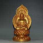 A gilt-brass statue of Tathagata Buddha from a private