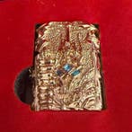 Zippo - Zippo Gold-Plated Gothic Skulls - Aansteker -, Verzamelen, Nieuw