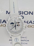 Swatch - MISSION TO EARTHPHASE - MOONSHINE GOLD fiocco di