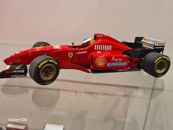Hot Wheels 1:18 - Model raceauto - Ferrari F310 - Michael, Hobby en Vrije tijd, Nieuw