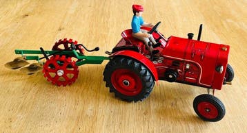 Kovap - Tracteur FAHR F22 en étain à remontoir avec remorque