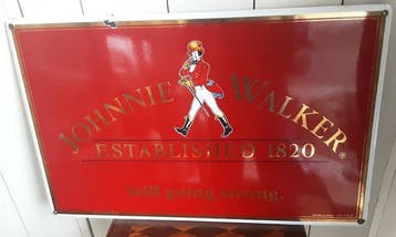 advertising sign for the Scottish whisky brand Johnnie