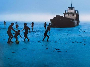 Steve McCurry (1950–) - Impromptu football match in Sittwe.