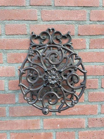 Decoratief ornament - Europa - Gietijzeren slanghouder