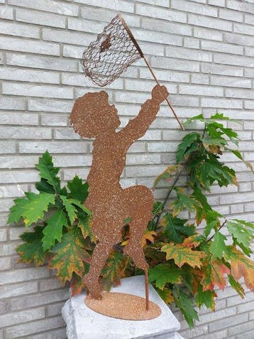 Beeld, garden statue silhouette of boy with butterfly net -