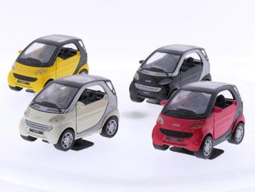 Schaal 1:33 Maisto set van 4 x Smart City-coupé #6980 (1:32, Ophalen of Verzenden