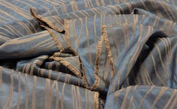 Jacquard moderno in seta e riflessi naturali – Castello del