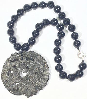 Onyx et amulette tibétaine de protection - Carpes de