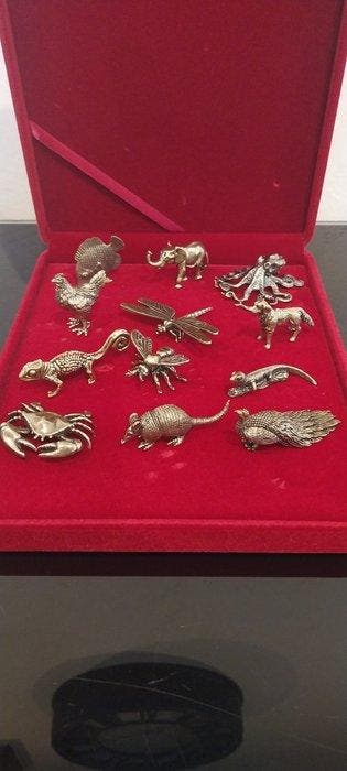 Porte couteau (12) - animaux exotiques - Laiton doré
