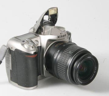 Nikon D50 + Nikkor AF- 18-55 DX + AF-Nikkor 70-300 mm -