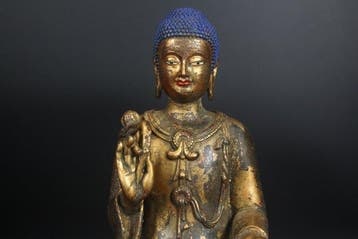 This is a seated Amitabha Buddha statue, strikingly similar