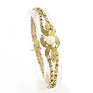 8 karaat florale armband met parel en zirconia, Gebruikt, Geel, Ophalen of Verzenden, Met edelsteen