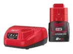 Veiling - Milwaukee 2Ah accu + lader, Nieuw