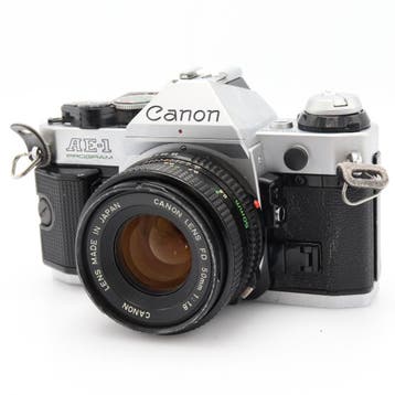 Canon AE-1 Program zilver + FD 50mm f/1.8 | Tweedehands, Verzenden, Zo goed als nieuw