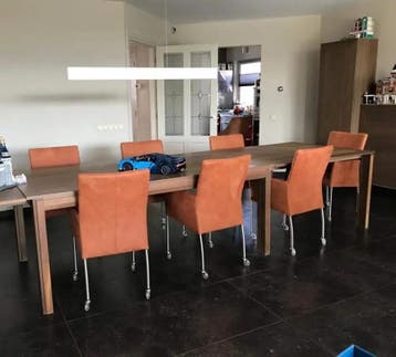 Set van 7 leren eetkamerstoelen met wieltjes en armleuning, Ophalen of Verzenden