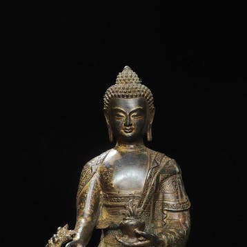 A Cold-Gilded Bronze Medicine Buddha from a Private