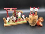 Creatieve kokeshi-stijl houten vossen uit de Toyokawa