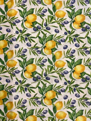 Elegante tafelkleed met citroenen en olijftakjes. -