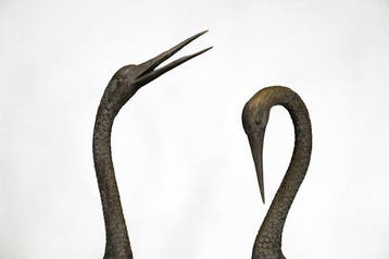 Metaal - Een monumentaal paar Japanse tuinornamenten: