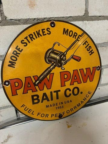 Rond metalen Paw Paw Bait Co. reclamebord – fishing reel