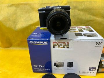 Olympus E-PL1 + lensadapter + Canon EF-S 18-55 IS Appareil