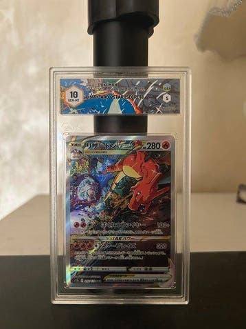 Pokémon - 1 Graded card - Charizard VSTAR 212/272 Secret