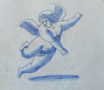 Carreau - Un Cupidon flottant. - 1650-1700
