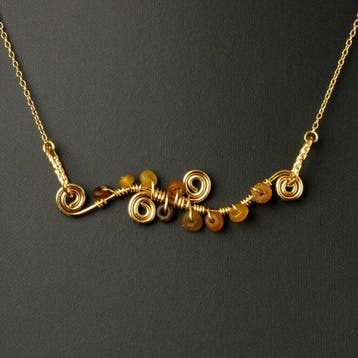 Oud-Romeins Ketting met amberkleurige Romeinse glazen kralen