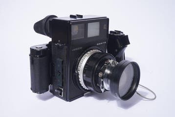Mamiya Universal con obiettivo Sekor 100/2,8 e dorso per