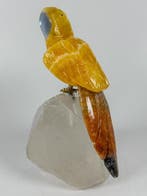 Beau morceau - Perroquet jaune sculpté à la main sur une