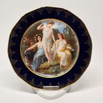 Matching pair of antique Royal Vienna style porcelain