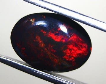 ct. 4,80 Opale noire éthiopienne naturelle - Cabochon -, Collections