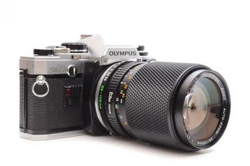 Olympus OM10 Includes manual adapter + Zuiko Auto-Zoom, Audio, Tv en Foto, Fotocamera's Analoog, Nieuw